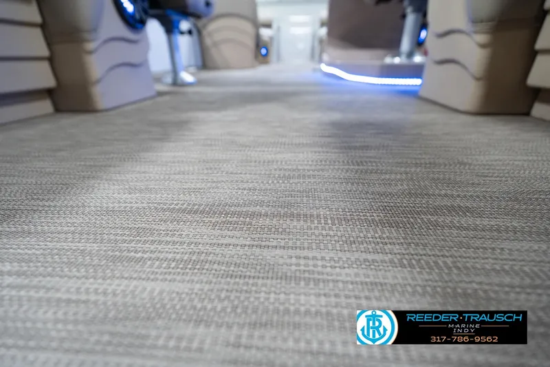 Slide: The Image of Interior view of 2020 Leisurecraft 2435 LX boat with textured flooring. - 43