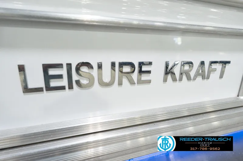 Slide: The Image of Leisurecraft 2435 LX 2020 model nameplate with Reeder-Trausch Marine contact details. - 50