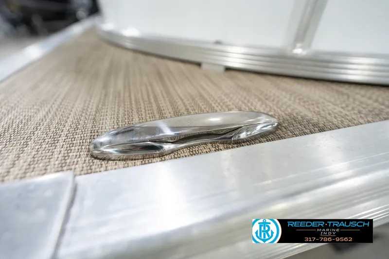 Slide: The Image of 2020 Leisurecraft 2435 LX boat cleat on textured deck surface. - 53