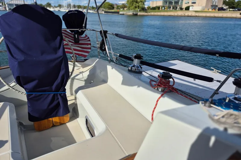 Slide: The Image of Cockpit of 1992 Pacific Seacraft Ericson 34 sailboat with winches and ropes. - 10
