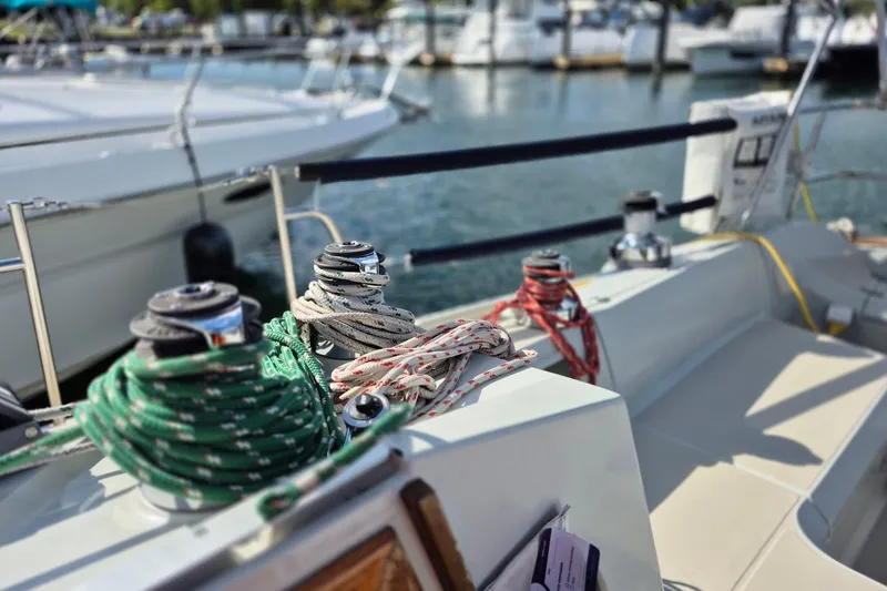 Slide: The Image of Close-up of winches and ropes on a 1992 Pacific Seacraft Ericson 34 sailboat. - 12