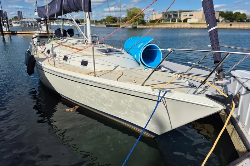 Slide: The Image of 1992 Pacific Seacraft Ericson 34 sailboat docked at marina, sunny day. - 3