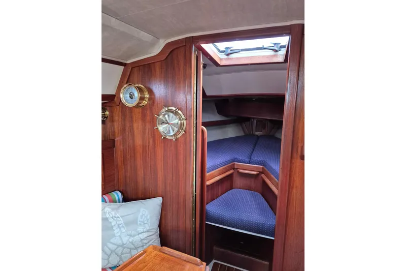 Slide: The Image of Interior of 1992 Pacific Seacraft Ericson 34 sailboat with wooden finish and cozy cabin. - 33