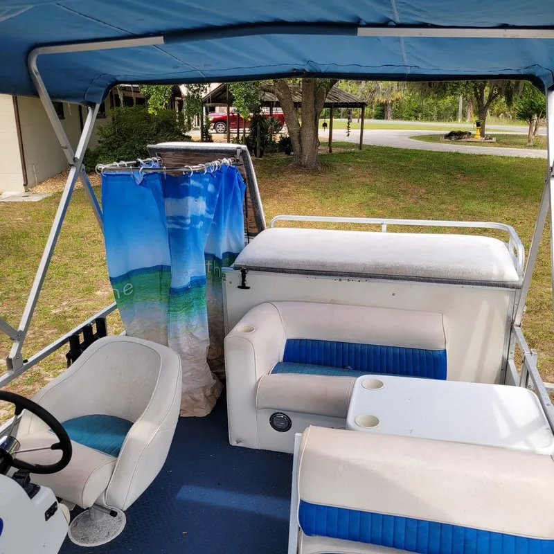 Slide: The Image of Riviera 25 Fish-N-Cruise Tritoon 1994 - 14