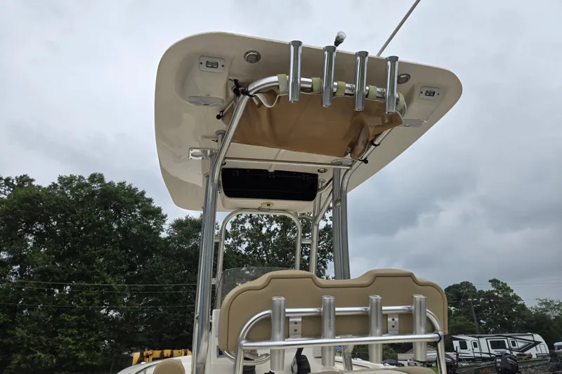 Slide: The Image of 2018 Key West 203 FS boat with T-top and rod holders under cloudy sky. - 7