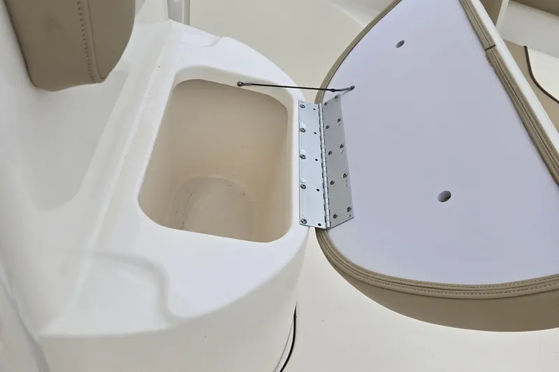 Slide: The Image of Open storage compartment on a 2018 Key West 203 FS boat seat. - 8