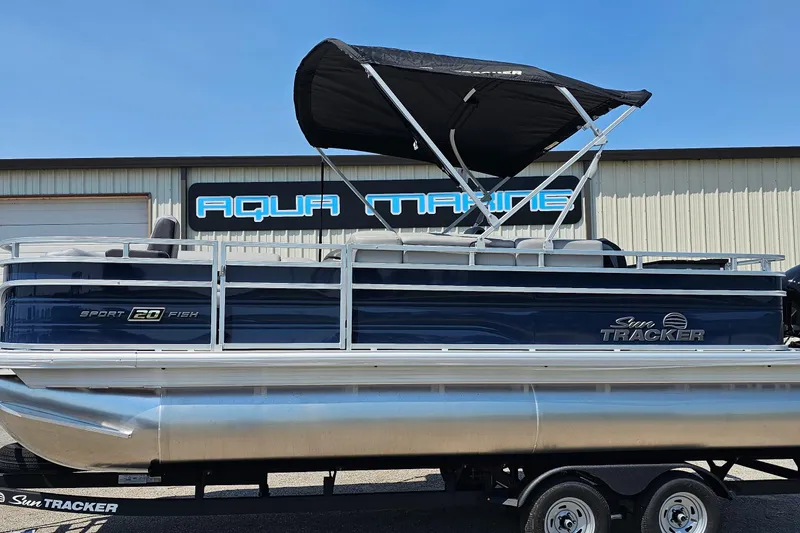 Slide: The Image of 2026 Sun Tracker SportFish 20 DLX pontoon boat with canopy at Aqua Marine. - 3