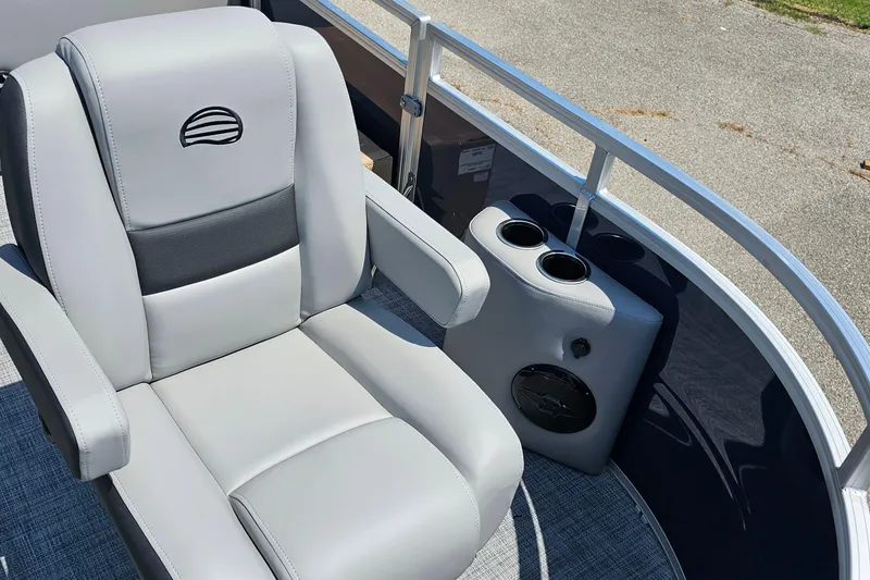 Slide: The Image of 2026 Sun Tracker SportFish 20 DLX boat seat with cup holders and speaker. - 7