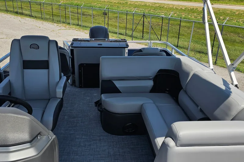 Slide: The Image of 2026 Sun Tracker SportFish 20 DLX pontoon boat with spacious seating and modern design. - 8