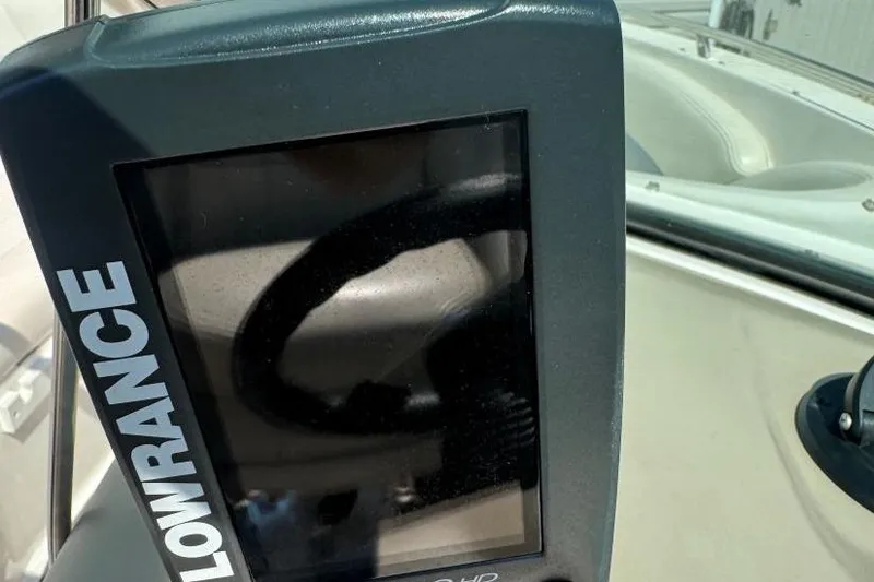 Slide: The Image of Lowrance GPS device on 2001 Chaparral 220 SSi boat dashboard. - 14
