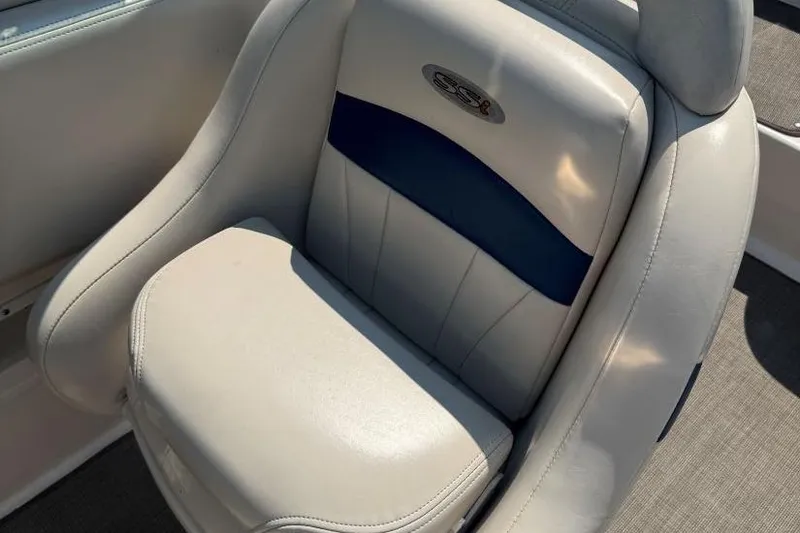 Slide: The Image of 2001 Chaparral 220 SSi boat seat with white and blue upholstery. - 17
