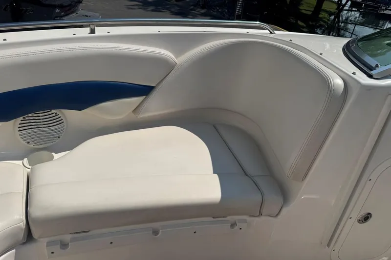 Slide: The Image of Chaparral 220 SSi 2001 boat interior seating with speaker and cup holder. - 27