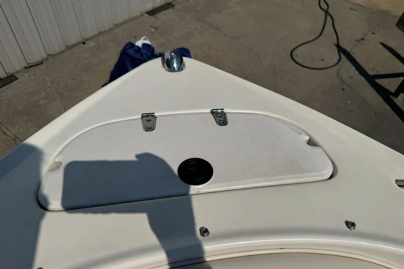 Slide: The Image of Bow of 2001 Chaparral 220 SSi boat with storage compartment. - 30