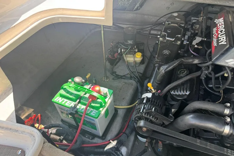 Slide: The Image of Engine compartment of a 2001 Chaparral 220 SSi with Interstate battery and Mercury MerCruiser components. - 35
