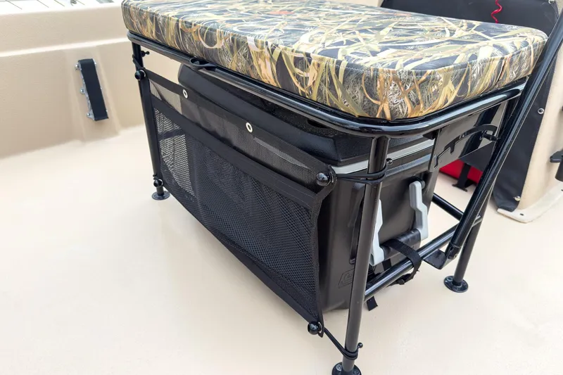 Slide: The Image of Camouflage seat and storage on 2026 Carolina Skiff E21 DLX CC boat. - 18