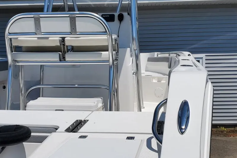 Slide: The Image of 2018 Release 208RX boat interior with sleek seating and chrome details. - 4
