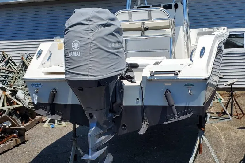 Slide: The Image of 2018 Release 208RX boat with Yamaha outboard motor, parked on a trailer. - 7