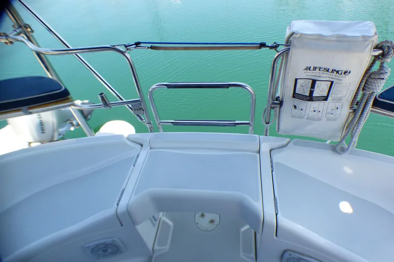 Slide: The Image of Cockpit view of 1993 Hunter 40.5 sailboat with Lifesling safety equipment. - 17