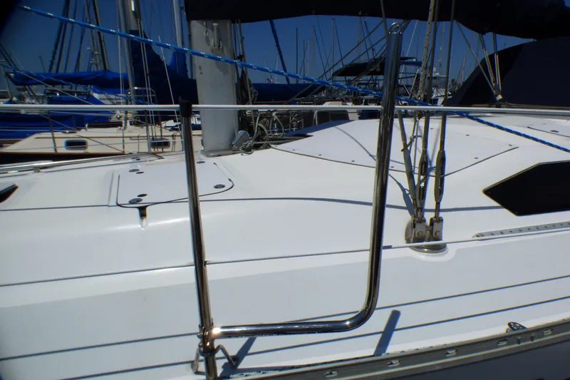 Slide: The Image of Sailboat deck of 1993 Hunter 40.5, featuring stainless steel railing and rigging. - 20