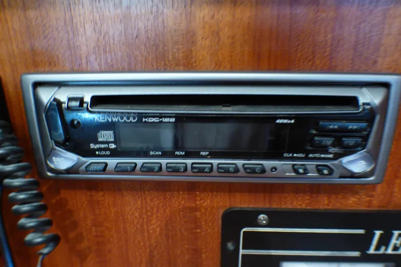 Slide: The Image of Kenwood KDC-122 car stereo installed in a 1993 Hunter 40.5 boat. - 38