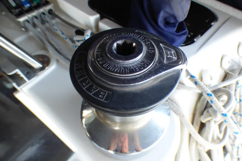 Slide: The Image of Winch on 1993 Hunter 40.5 sailboat with ropes and control panel. - 56