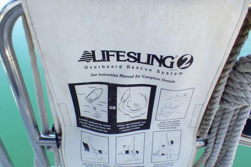 Slide: The Image of Lifesling 2 overboard rescue system instructions on a 1993 Hunter 40.5 sailboat. - 59