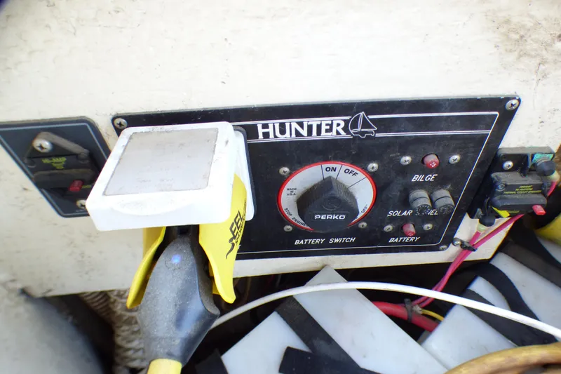 Slide: The Image of Control panel of a 1993 Hunter 40.5 sailboat with battery switch and wiring. - 60