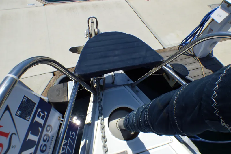 Slide: The Image of Bow of 1993 Hunter 40.5 sailboat with anchor and chain, docked at marina. - 70