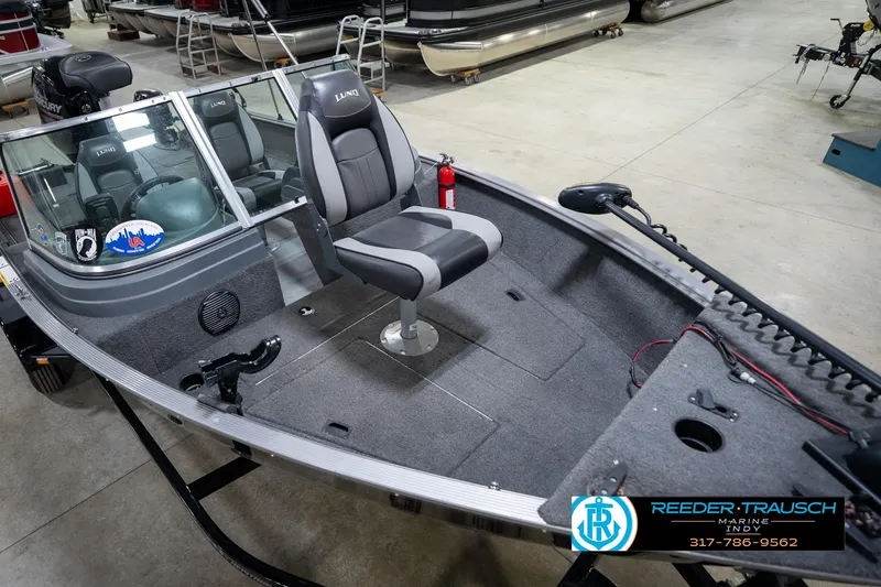 Slide: The Image of 2014 Lund 1650 Rebel XS fishing boat interior with seating and equipment. - 13