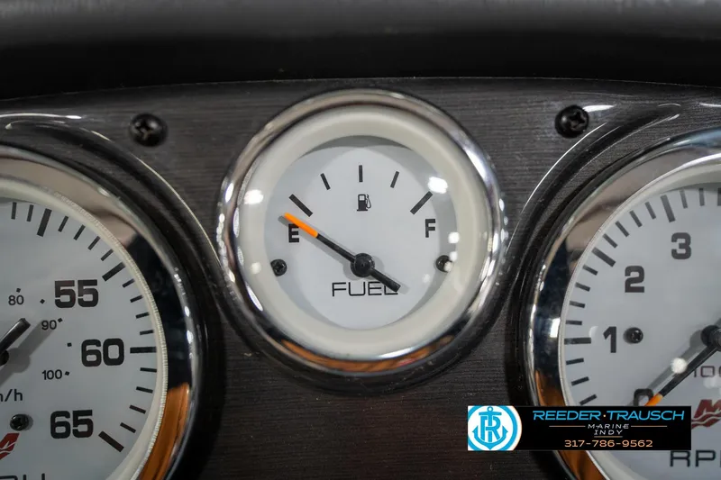 Slide: The Image of Close-up of 2014 Lund 1650 Rebel XS fuel gauge, showing near empty. - 37