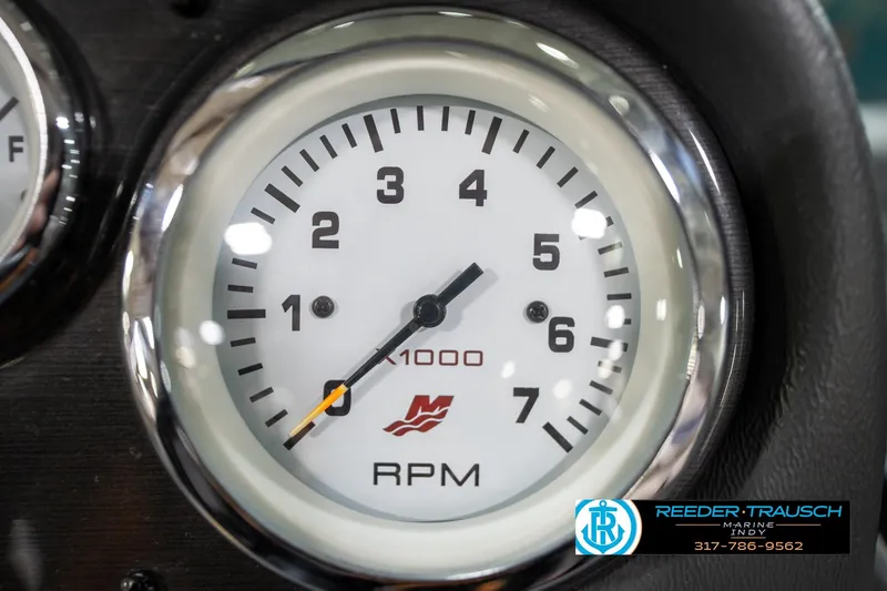 Slide: The Image of Close-up of RPM gauge on 2014 Lund 1650 Rebel XS boat dashboard. - 38