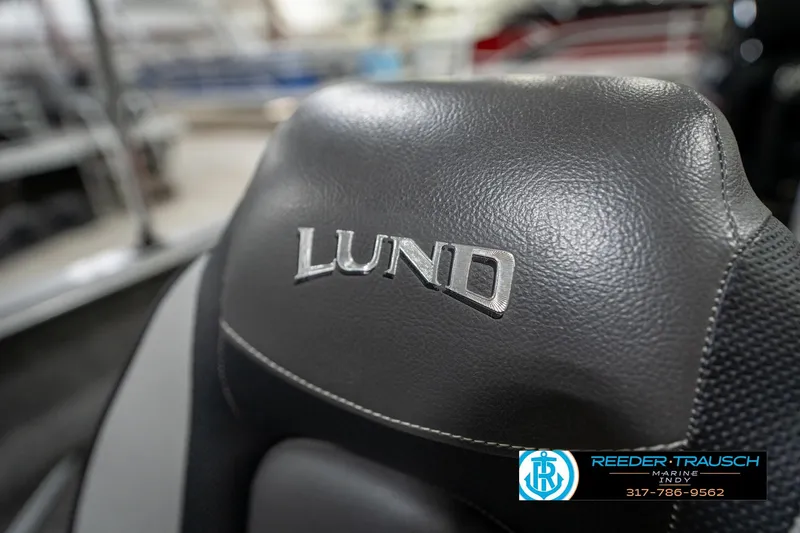 Slide: The Image of Close-up of 2014 Lund 1650 Rebel XS boat seat with logo. - 44