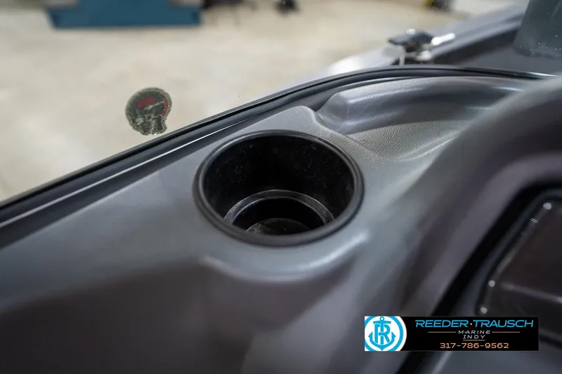 Slide: The Image of 2014 Lund 1650 Rebel XS boat interior with cup holder detail. - 45