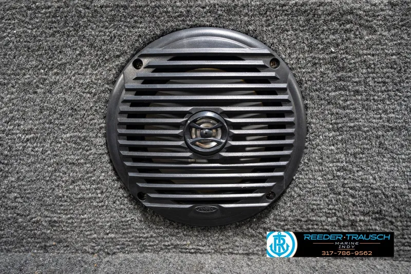 Slide: The Image of Speaker installed on 2014 Lund 1650 Rebel XS boat, gray carpeted surface. - 46