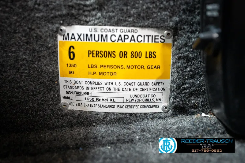 Slide: The Image of 2014 Lund 1650 Rebel XS capacity label, 6 persons or 800 lbs, U.S. Coast Guard compliant. - 65