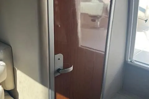 Slide: The Image of Interior cabin door of a 2001 Chaparral 265 SSi boat. - 15