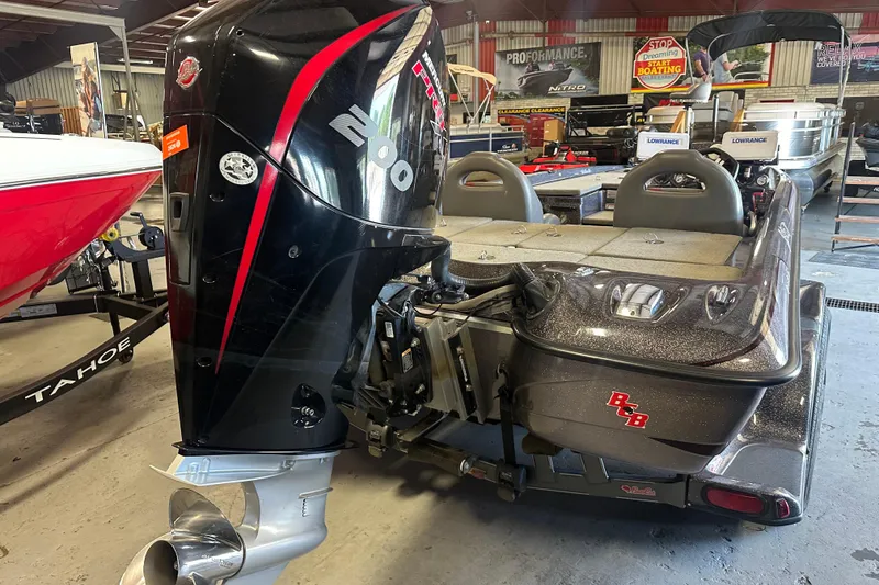 Slide: The Image of 2021 Bass Cat Pantera II boat with powerful 200 HP engine in showroom. - 16