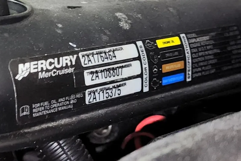 Slide: The Image of Mercury MerCruiser engine label with serial numbers on a 2014 Monterey 204FSX. - 11