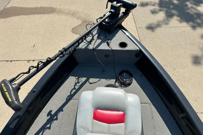 Slide: The Image of 2011 Tracker Super Guide V 16 SC boat interior with trolling motor and seat. - 3