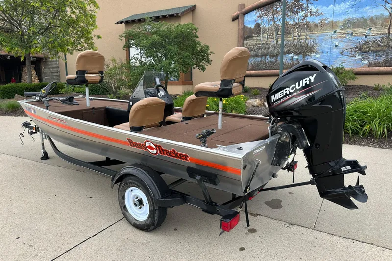 Slide: The Image of 2018 Tracker Bass Tracker Classic XL boat with Mercury engine on trailer. - 2