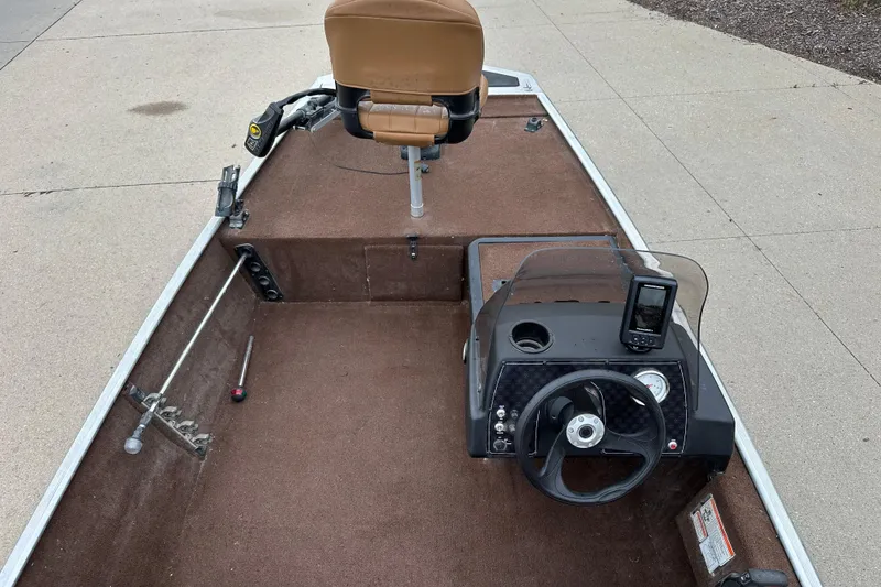 Slide: The Image of 2018 Tracker Bass Tracker Classic XL boat interior with steering wheel and seat. - 3