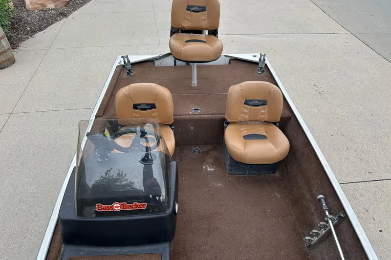 Slide: The Image of 2018 Tracker Bass Tracker Classic XL boat with tan seats and brown interior. - 5