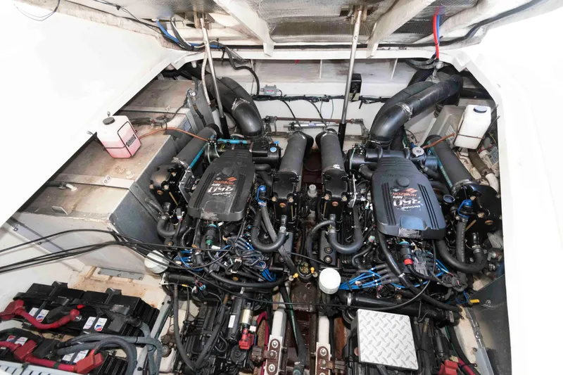 Slide: The Image of Engine compartment of a 2007 Sea Ray 310 Sundancer, showcasing dual engines and components. - 20