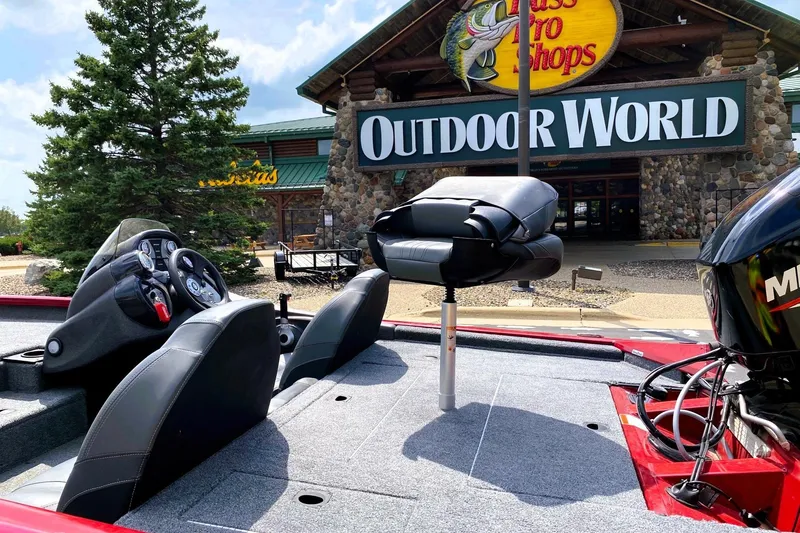 Slide: The Image of 2022 Tracker Pro Team 175 TXW boat at Bass Pro Shops Outdoor World entrance. - 2
