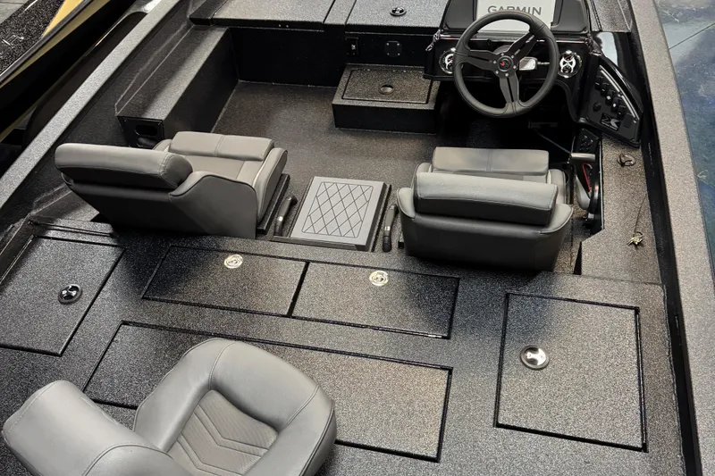Slide: The Image of Interior of 2025 Xpress X19 Pro boat with seating and Garmin dashboard. - 3
