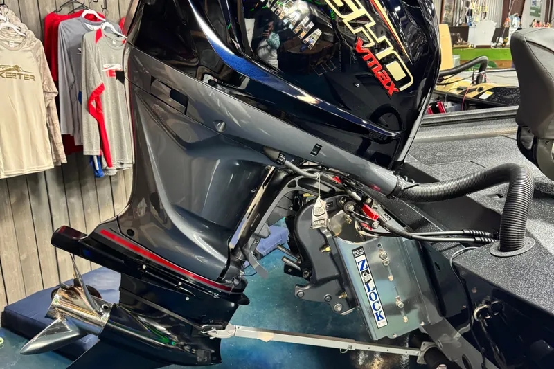 Slide: The Image of 2025 Xpress X19 Pro boat engine with VMAX SHO motor, displayed indoors. - 8