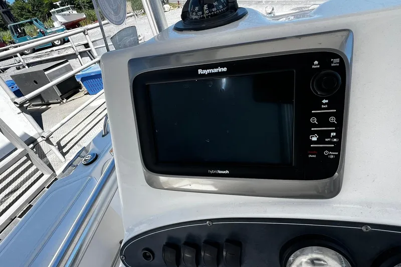 Slide: The Image of Raymarine display on 2006 Boston Whaler 210 Outrage boat dashboard. - 17