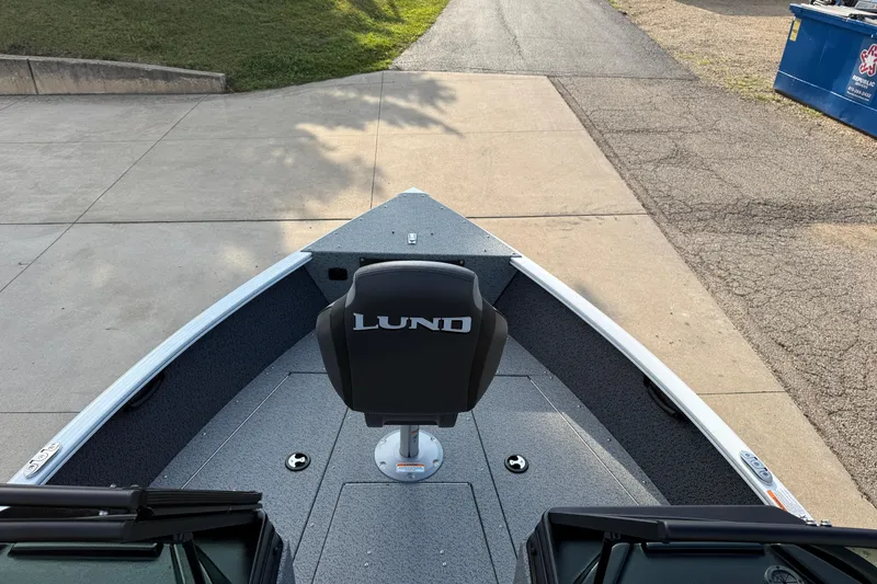 Slide: The Image of 2026 Lund 1675 Adventure Sport boat, featuring a sleek design and comfortable seating. - 9