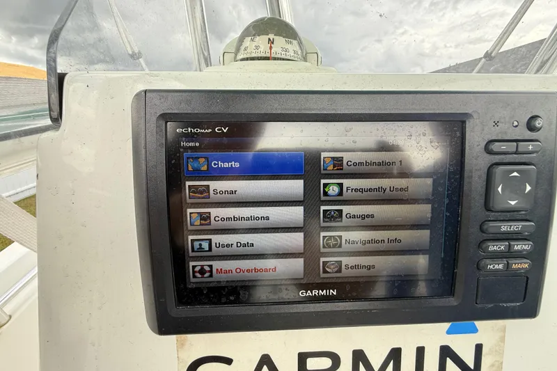 Slide: The Image of Garmin echomap CV display on Release 208 RX boat, showing navigation and sonar options. - 14