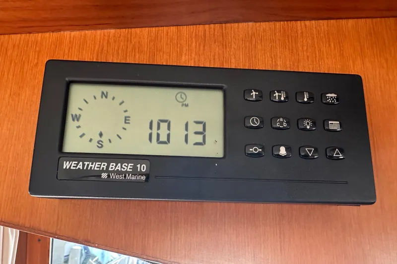 Slide: The Image of Weather Base 10 marine instrument on 2000 Eagle 40 Pilothouse Trawler dashboard. - 38